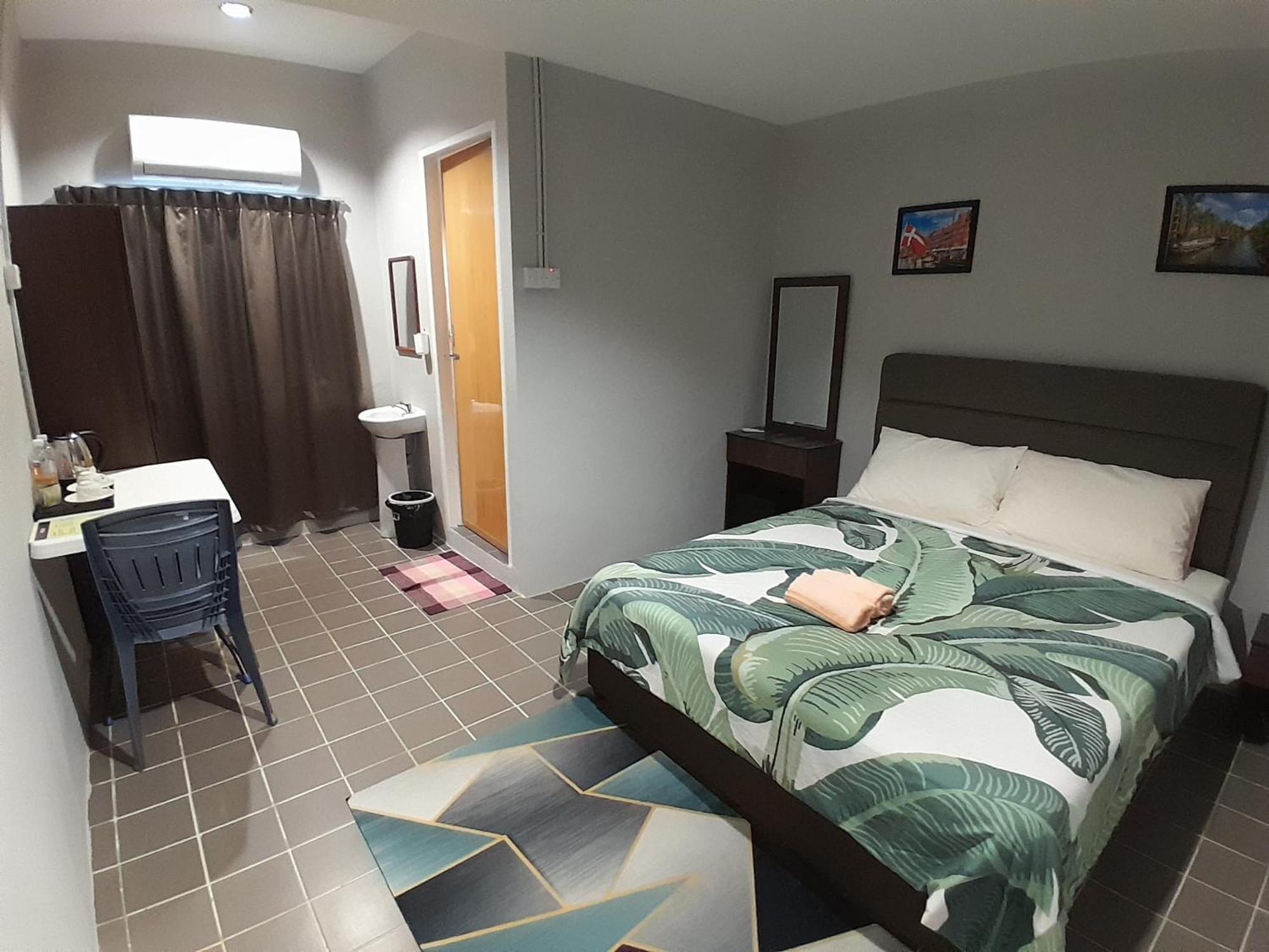 Отель Putra Sentosa Retreat Camp, Sematan Номер фото